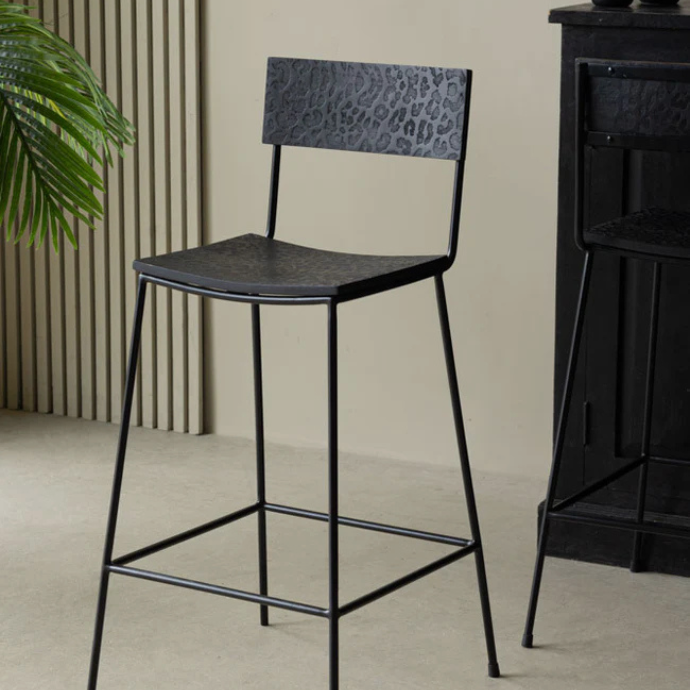 KARSTEN Bar Stool – Modern Form with Wild Detail