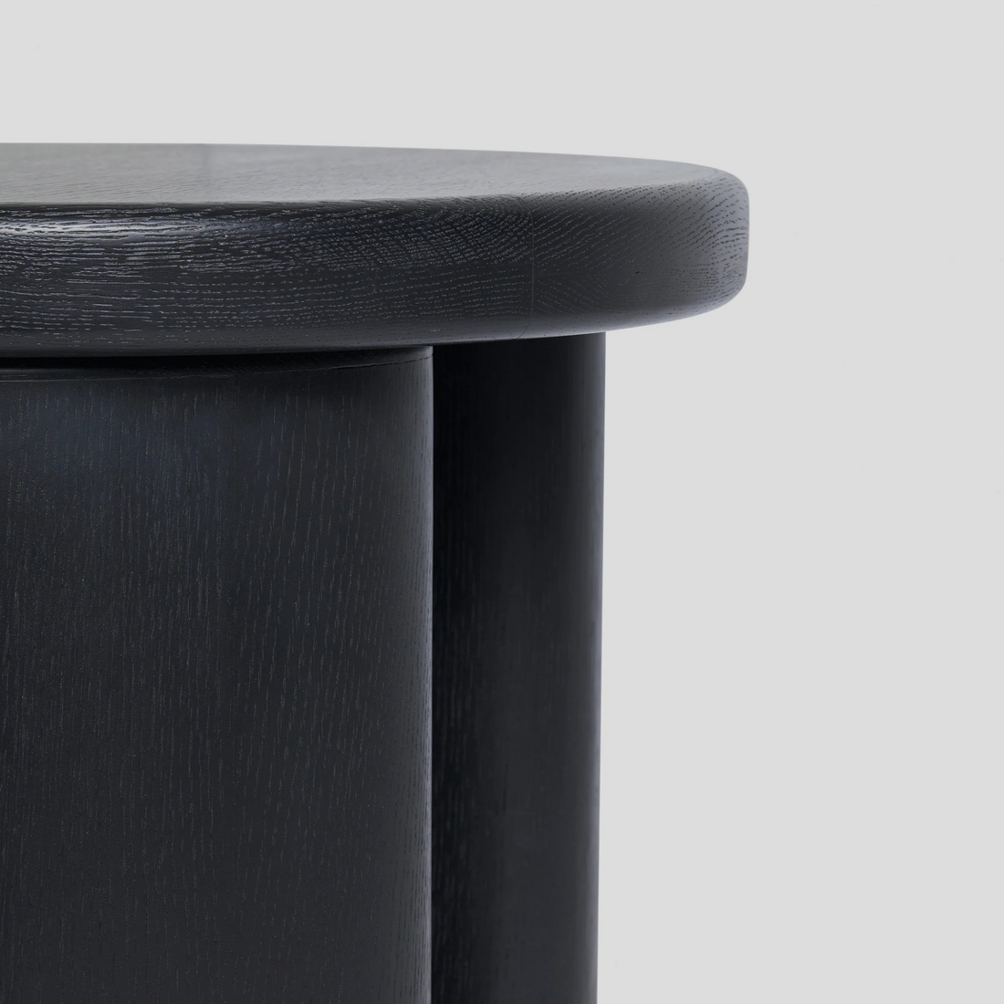 NERO Side Table – Bold Sculpture in Blackened Ash