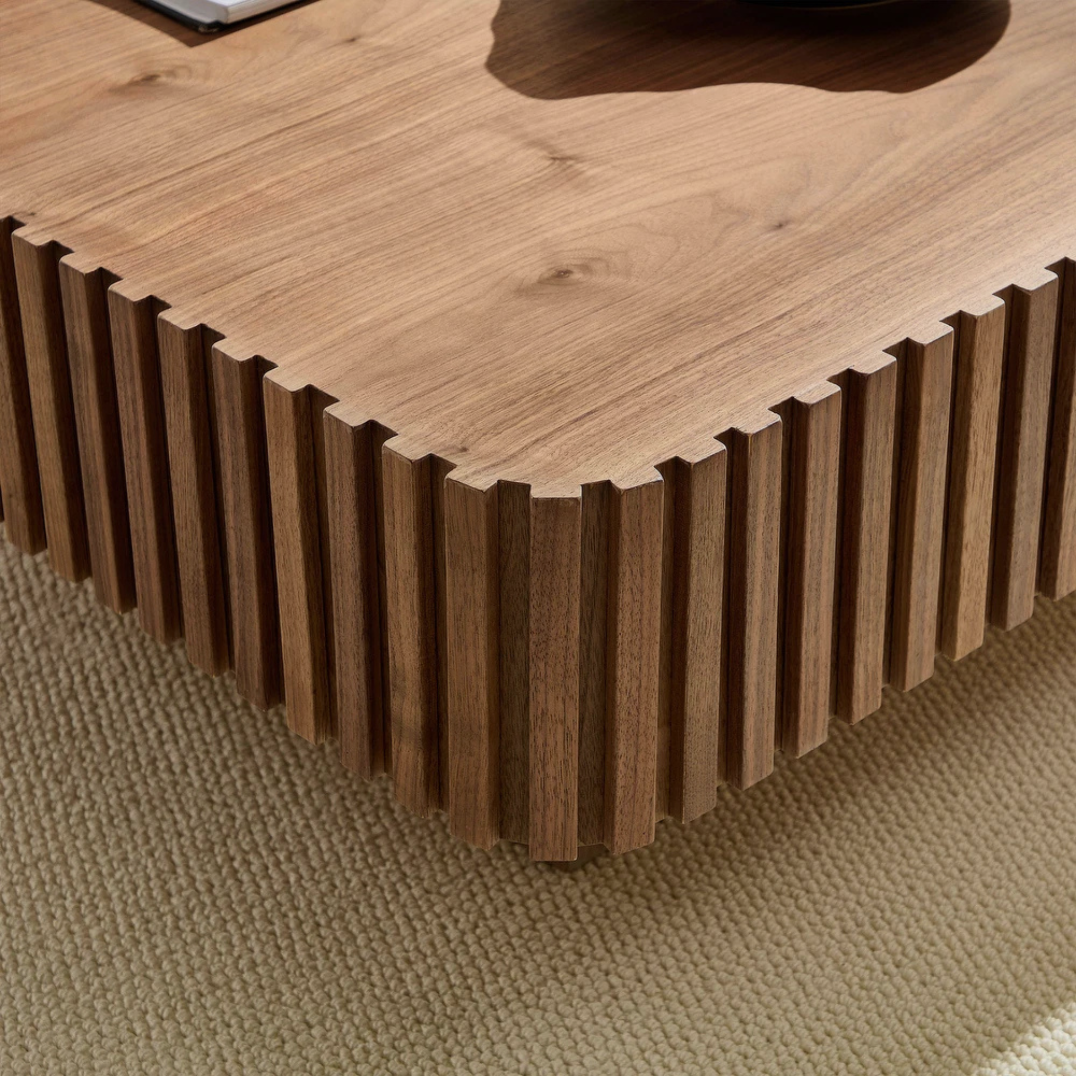 Rivo Coffee Table – Sculpted Boldness in Walnut